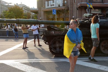People inspect the destroyed equipment of the Russian army displayed at Khreshchatyk in the center of Kyiv. Ukrainians will celebrate the 31st anniversary of Independence Day on August 24, 2022. Russia invaded Ukraine on February 24, 2022, triggering