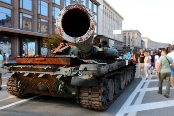 People inspect the destroyed equipment of the Russian army displayed at Khreshchatyk in the center of Kyiv. Ukrainians will celebrate the 31st anniversary of Independence Day on August 24, 2022. Russia invaded Ukraine on February 24, 2022, triggering