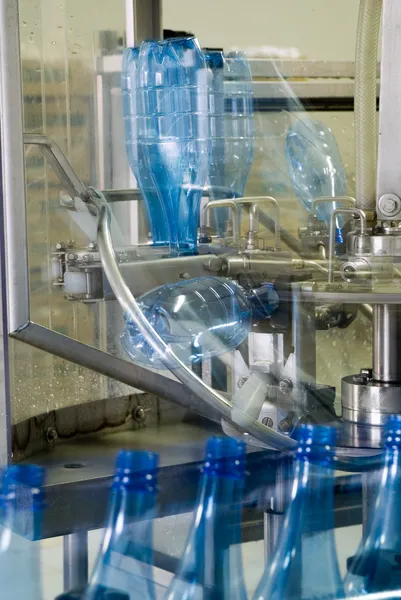 Motion blur water production machine — Stock Photo, Image