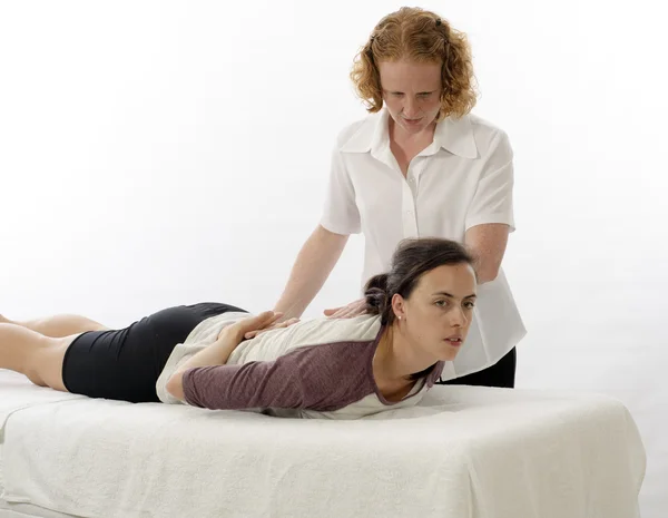 Kinesiologist treating Sacrospinalis — Stock Photo, Image