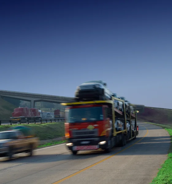 Bulk car haulage truck on highway — Stock Photo, Image