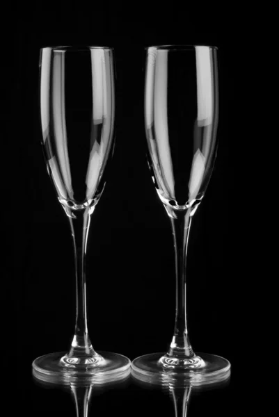 Šampaňské flétny odráží v zrcadle — Stock fotografie