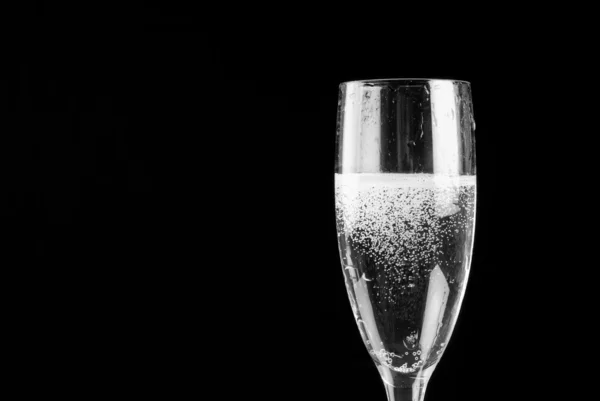 Champagne flute filled with sparkling wine — Stock Photo, Image