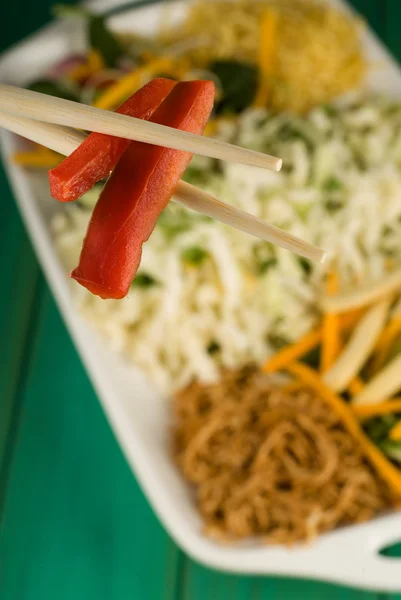 Chopsticks and stir fry — Stock Photo, Image