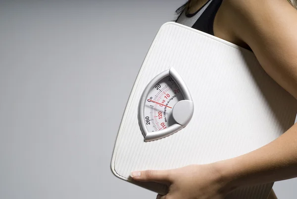 Diet scale and woman close up — Stock Photo, Image