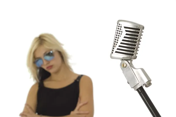 Retro microphone and singer with sun glasses — Stock Photo, Image