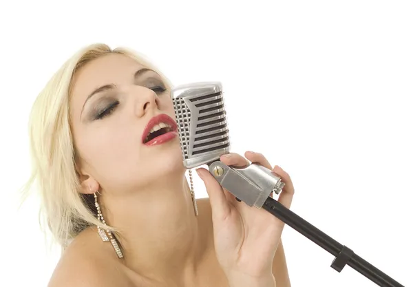 Eyes closed woman and microphone — Stock Photo, Image