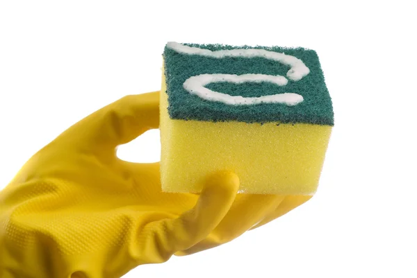 Yellow cleaing sponge and hand — Stock Photo, Image