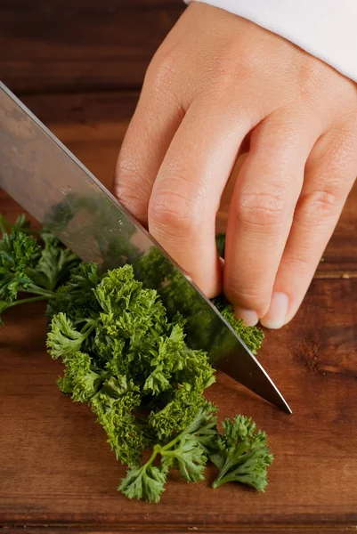 Chopping parsley — Stock Photo, Image