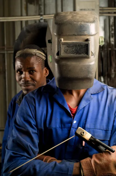 African welder with mask — Stock Photo, Image