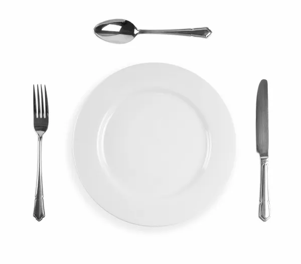 Knife, fork, plate and spoon — Stock Photo, Image