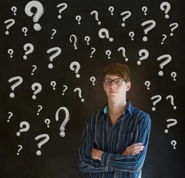 Thinking business man with chalk question marks — Stock Photo, Image