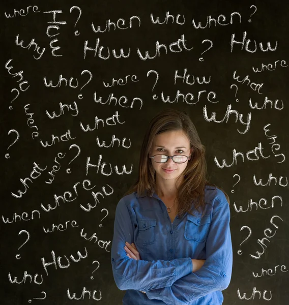 Thinking business woman with chalk questions — Stock Photo, Image