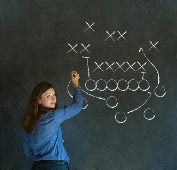 Woman with American football strategy on blackboard — Stock Photo, Image