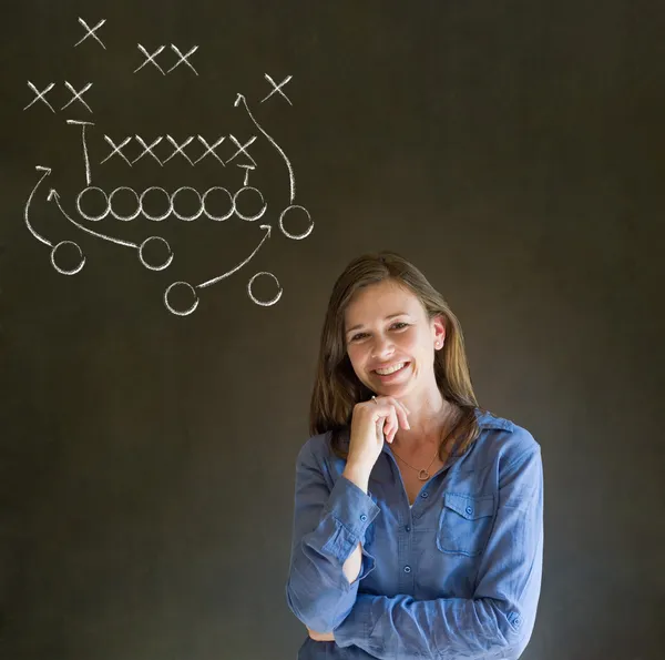 Woman with American football strategy on blackboard — Stock Photo, Image