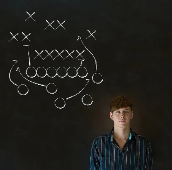 Man with American football strategy on blackboard — Stock Photo, Image