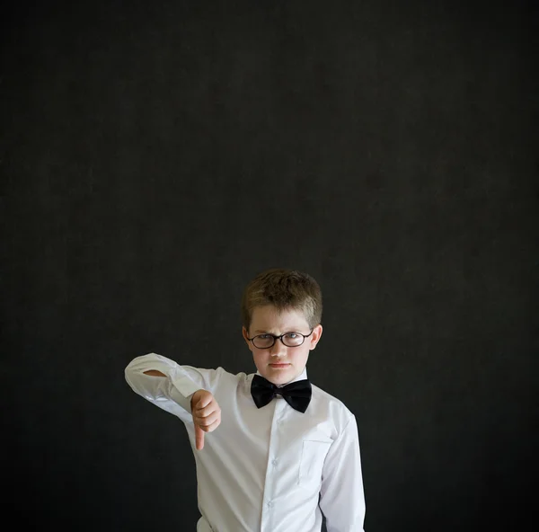 Thumbs down boy dressed up as business man — Stock Photo, Image