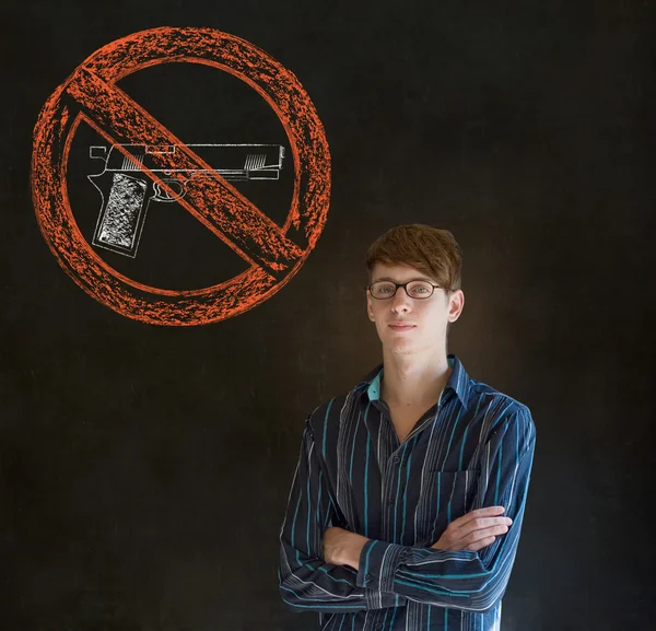 No guns pacifist business man, student, teacher or politician on blackboard background — Stock Photo, Image