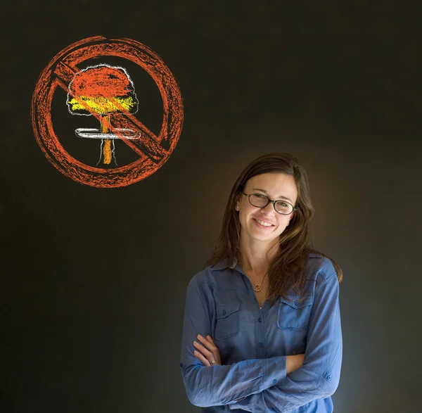 No nuclear war pacifist business woman, student, teacher or politician on blackboard background — Stock Photo, Image