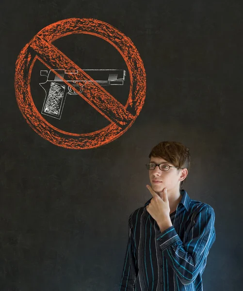 No guns pacifist business man, student, teacher or politician on blackboard background — Stock Photo, Image