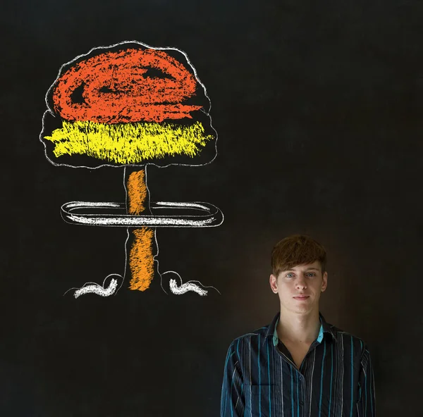 Man thinking chalk nuclear bomb cloud blackboard background — Stock Photo, Image