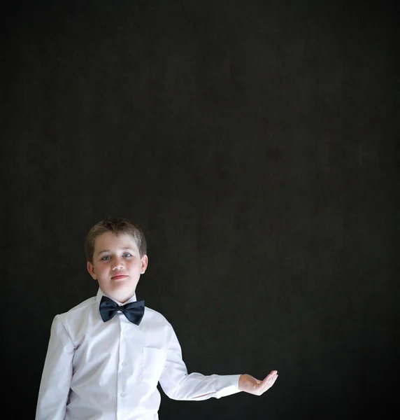 Boy dressed up as businessman holding anything on cupped hand — Stock Photo, Image