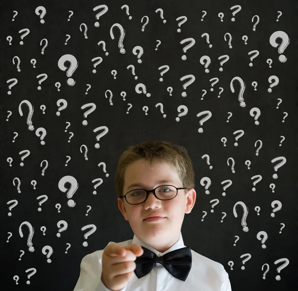 Education needs you thinking boy dressed as business man with chalk question marks — Stock Photo, Image