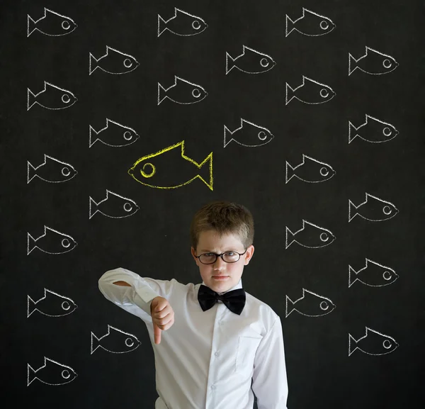 Thumbs down boy dressed as business man with independent thinking chalk fish — Stock Photo, Image