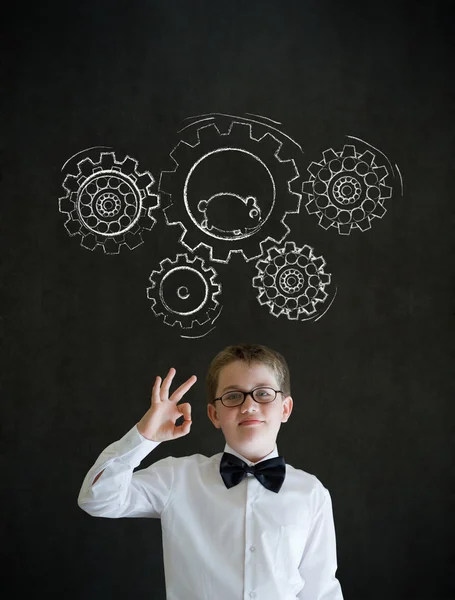 All ok boy dressed as business man with chalk turning gear cogs and running hamster — Stock Photo, Image