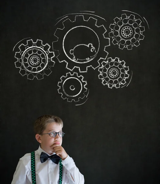 Thinking boy dressed as business man with chalk turning gear cogs and running hamster — Stock Photo, Image