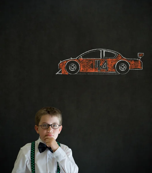 Pensando menino homem de negócios com carro de ventilador de corrida Nascar — Fotografia de Stock