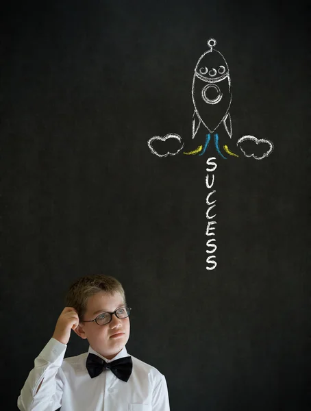 Scratching head thinking boy business man with chalk success rocket — Stock Photo, Image