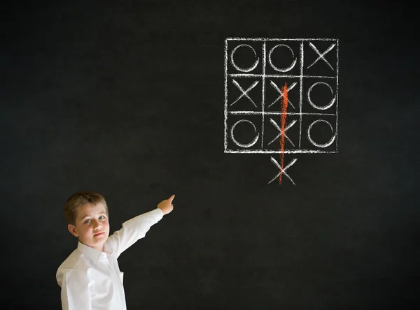 Pointing boy business man with thinking out of the box tic tac toe concept — Stock Photo, Image