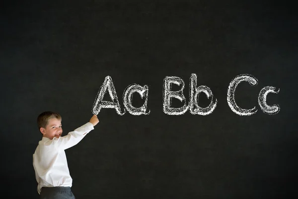 Schrijven jongen business man met leren Engels taal alfabet — Stockfoto