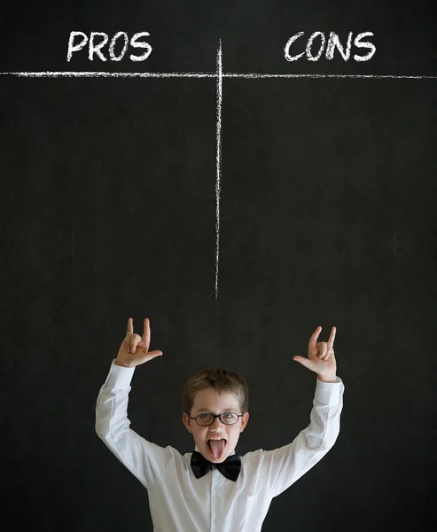 Knowledge rocks boy business man with pros and cons list — Stock Image Knowledge rocks boy business man with pros and cons list Stock Picture