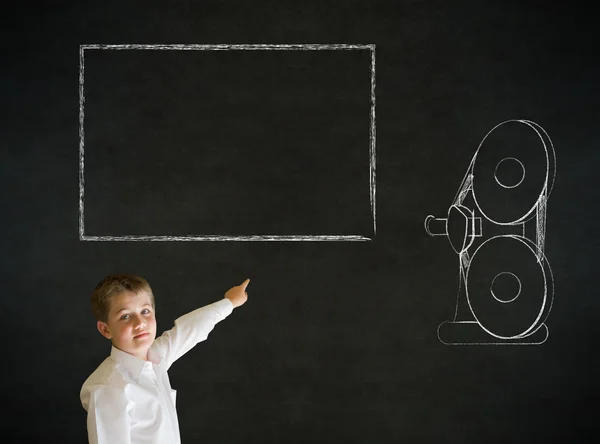 Pointing boy business man with retro chalk film projector — Stock Photo, Image