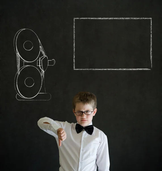 Thumbs down boy business man with retro chalk film projector — Stock Photo, Image