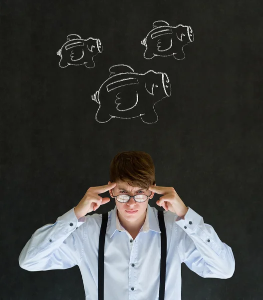 Thinking businessman with flying money piggy banks in chalk on blackboard background — Stock Photo, Image