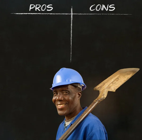 African American black man worker with chalk pros and cons decision list — Stock Photo, Image