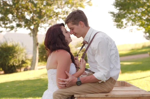 Bride and groom outside church — Stock Photo, Image