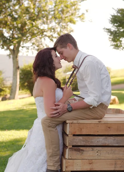 Bride and groom outside church — Stock Photo, Image