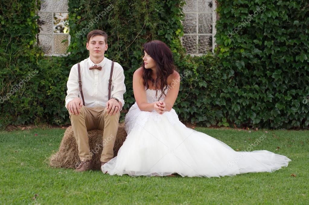 Hillbilly hipster vintage bride and groom outside church Stock Photo alistairjcotton 44617737