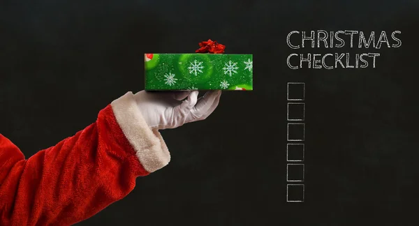 Noel Baba el ve hediye — Stok fotoğraf