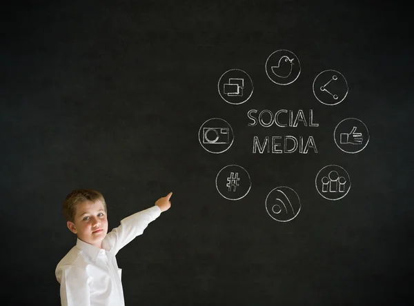 Pointing boy business man with social media icons — Stock Photo, Image