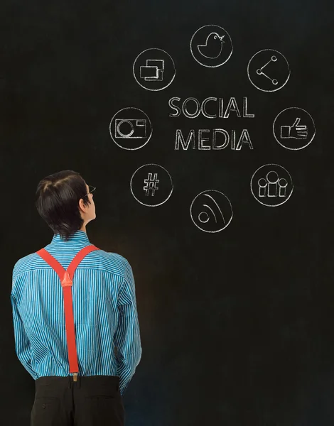 Nerd geek zakenman met social media iconen — Stockfoto