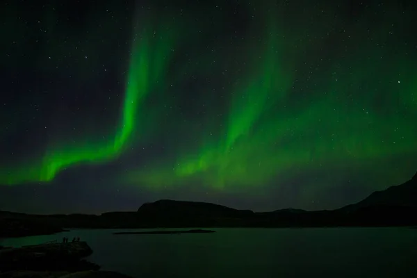 그린란드 갈리코의한 위에서 일어나는 북극광 스톡 이미지