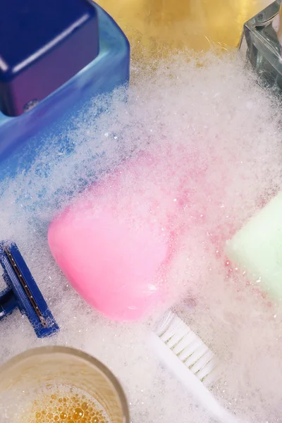 Personal hygiene items, in the suds. — Stock Photo, Image