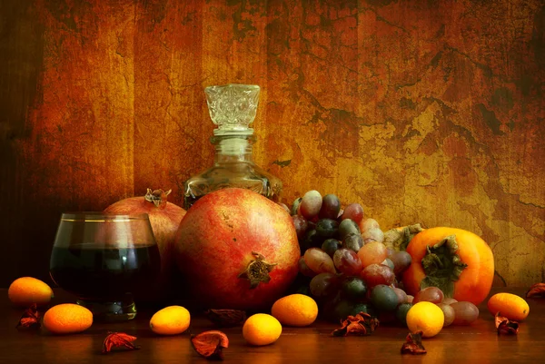 Persimmon, pomegranate and citrus fruits — Stock Photo, Image