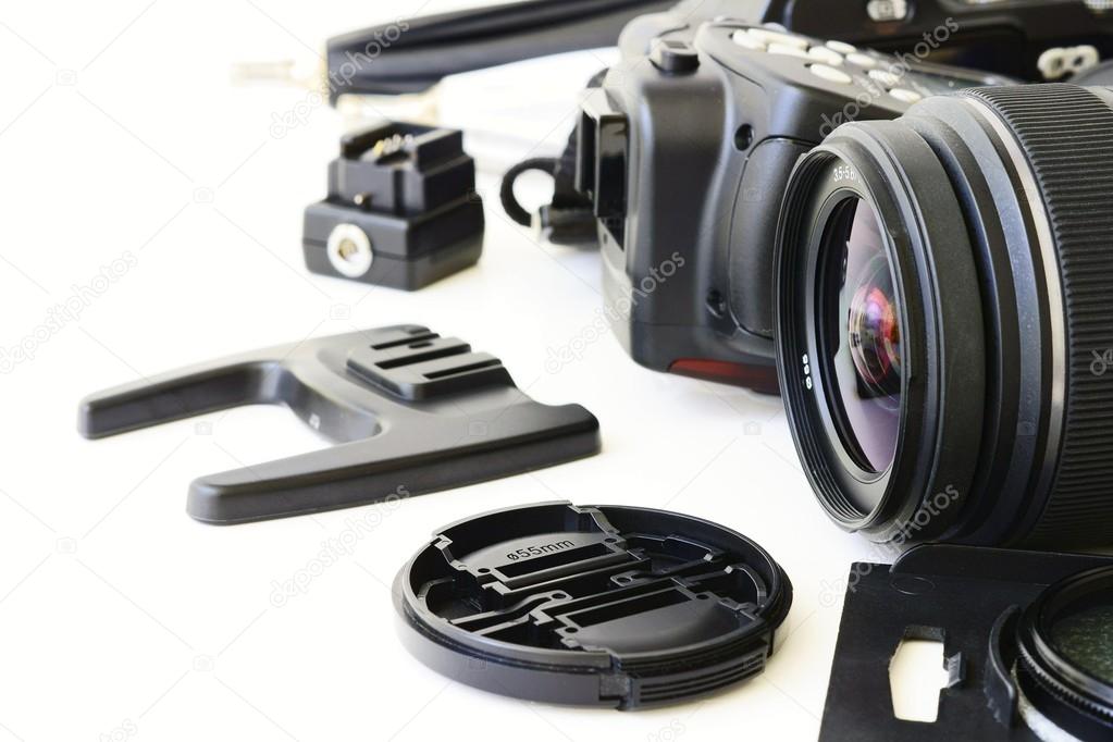 The lens is surrounded by other equipment to take pictures