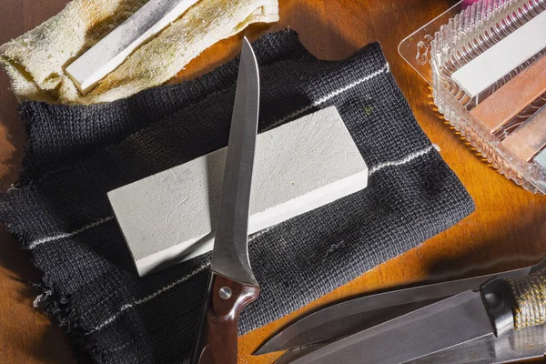 Sharpening knives, on a special stone